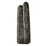 A dark stone two-fingers amulet, the stylised fingers engraved with the fingernails and on the