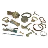 A collection of bronze and iron items, including a macehead, handles, Iron Age and later (18)