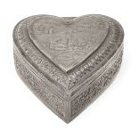 A silver heart casket, possibly Burma, early 20th century, decorated to lid with a village scene and