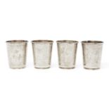 Four silver gilt beakers, Ottoman Egypt, engraved either side with lobed medallion containing