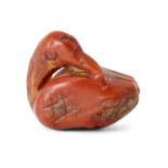 A carved carnelian duck weight, possibly Babylonian, 2cm. diam. Provenance: Private Collection