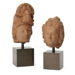WITHDRAWN Two red clay Bodhisattva heads, Gandhara, 2nd-4th century, each with rounded face with a