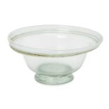 A Roman pale green glass bowl with collar rim and tooled ring base, circa 4th Century A.D., 13cm