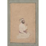 A portrait of a kneeling Maharaja, Rajasthan, India, 19th century, opaque pigments and ink on paper,