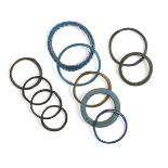 A collection of Roman and Islamic glass bangles, four small bangles of dark blue glass, three