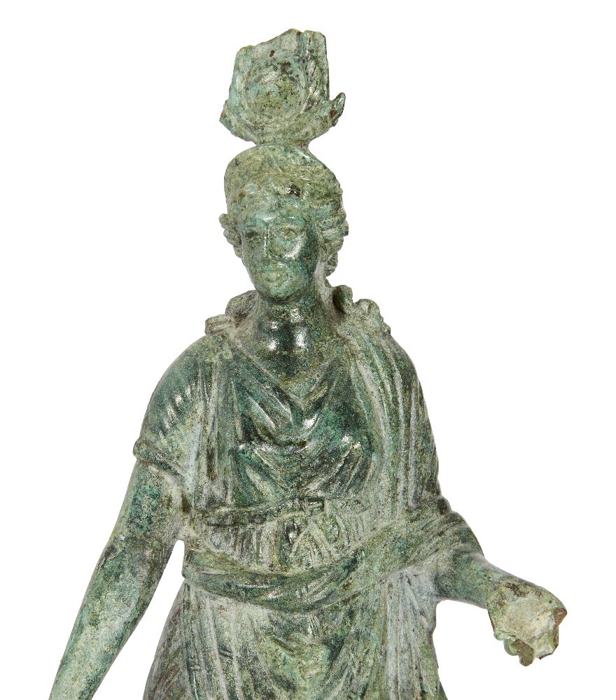 A Hellenistic bronze statue of the Isis Fortuna, 1st Century B.C., the goddess stands with her - Image 2 of 6