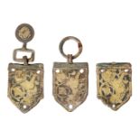 Three silver gilt buckle elements, Iran or Islamic Spain, 14th century, each of rectangular form