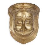 A large Narisama brass mask, late 19th century, with moulded eyes, nose and moustache, 28cm.