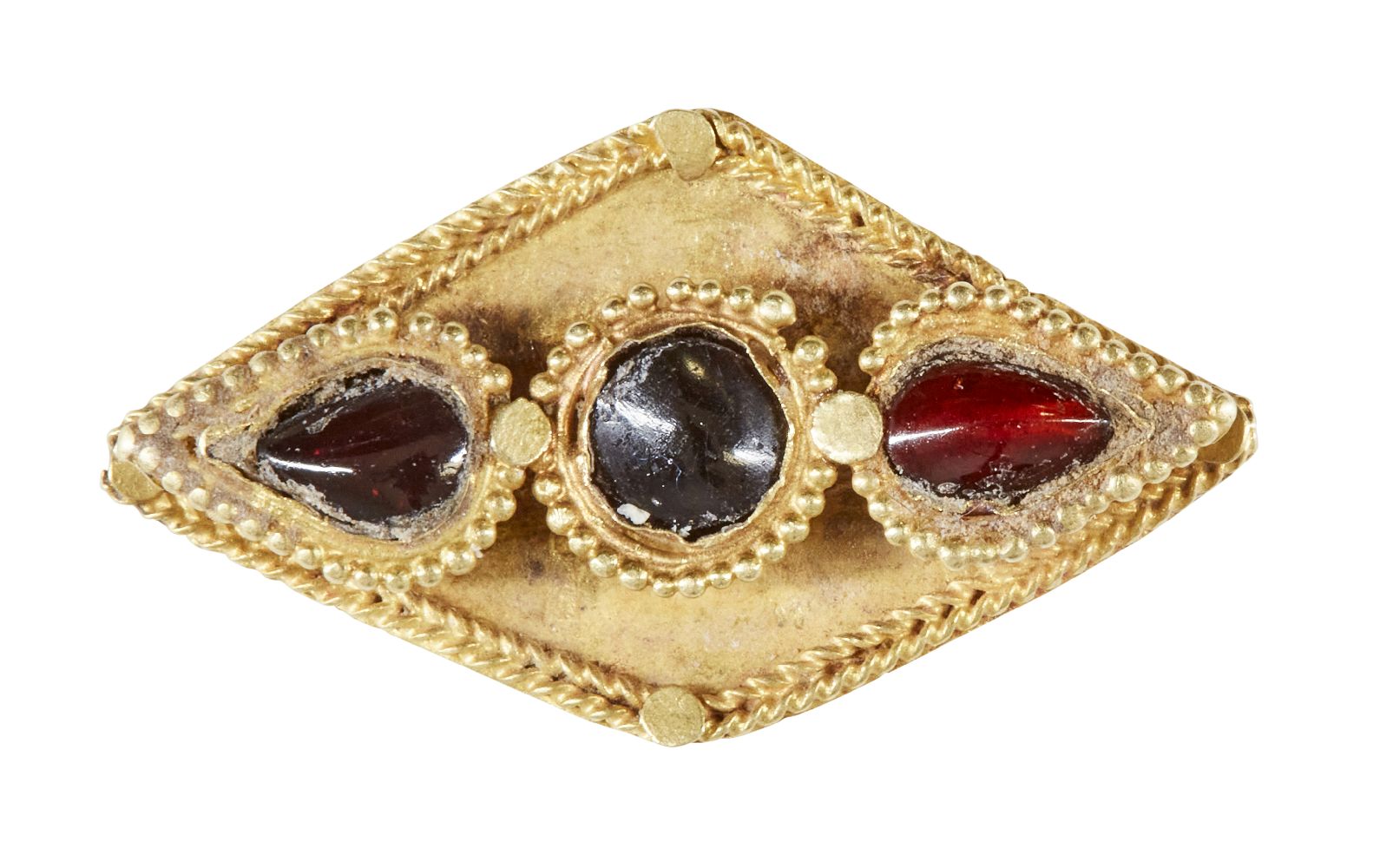 A garnet set gold element, Iran, 12th-13th century, of diamond-form, the central round stone with