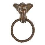 A bronze door knocker with elephant head, India, 19th century, the ring of twisted rope form, the