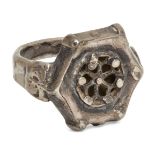 An openwork silver filigree ring with hexagonal-shaped bezel, Khorasan, Iran, 13th century, 2.5cm.