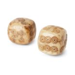 Two ivory die with concentric circles, Iran, 19th century or earlier, each approx. 1.4cm. high (2)