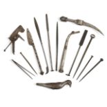 A group of Safavid steel tools, Iran, 17th-18th century, comprising a pair of tweezers, a knife, a