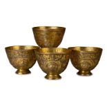 Four Ottoman Tombak gilded copper cups, Turkey, 19th century, each on a short foot, the sides with