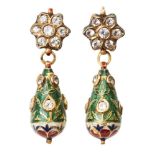 A pair of diamond set and enamelled gold earrings, India, 19th century, formed of a flower head