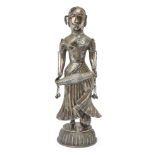 A large silvered metal figure of a female drummer, India, 20th century, on a high domed base, her