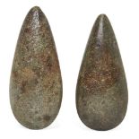 Two Neolithic polished stone axe heads, 15cm. and 13.2cm. long (2) Provenance: Private Collection
