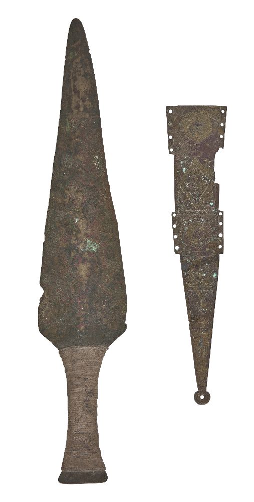 A Roman bronze dagger sheath element, circa 1st century A.D., with the principal part of one side of