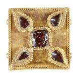 A garnet set gold element, Iran, 12th-13th century, of square form, the central square stone with