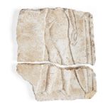 An Egyptian style limestone relief, carved with the profile of an Amarna style princess with