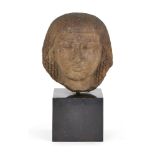 An Egyptian-style quartzite head, with curled hair, fringe, on square mount, Not ancient, 11.5cm.