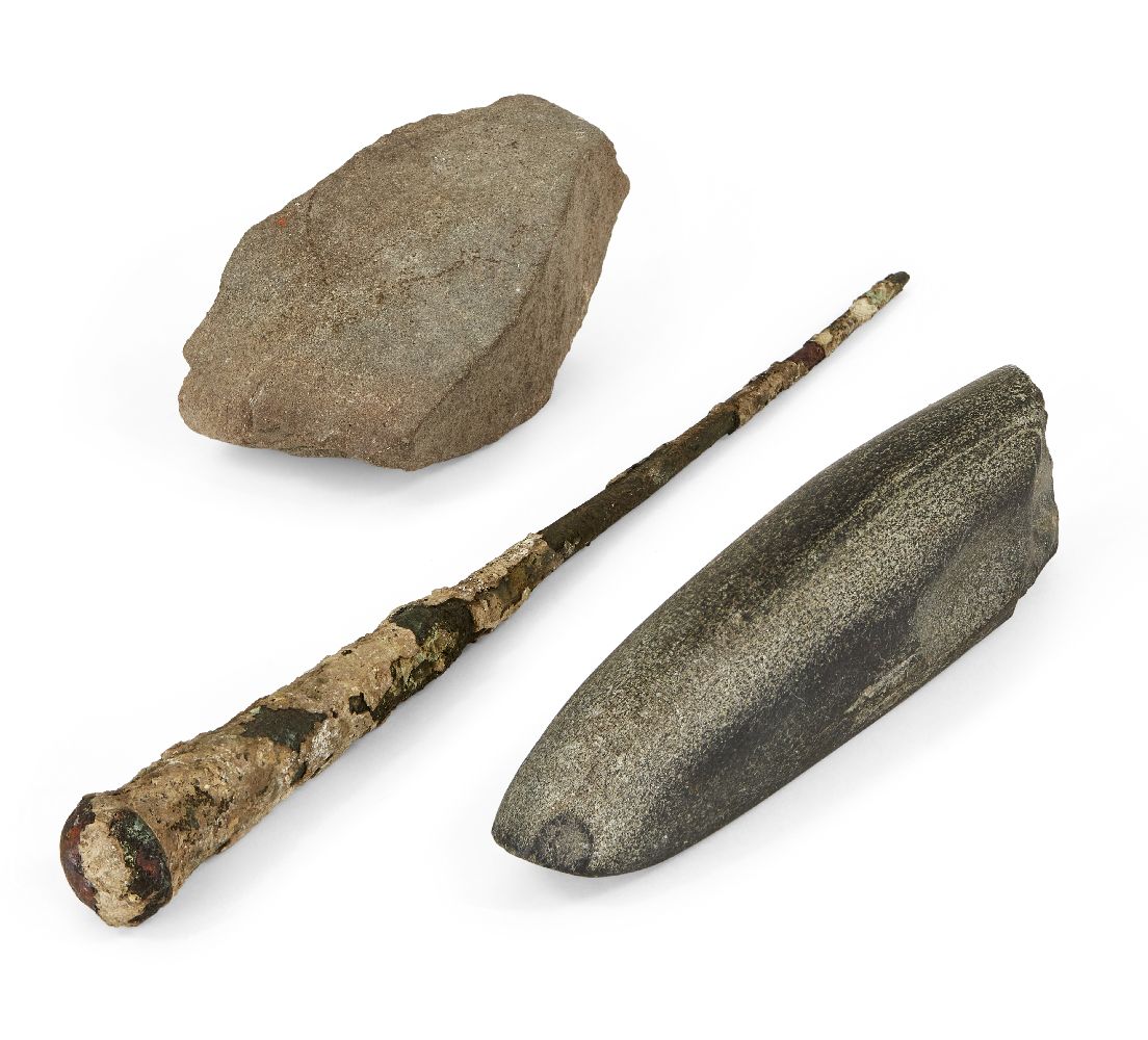 A Neolithic basalt whetstone (blade sharpener), 14.8cm; an iron nail, 26cm and a stone fragment,