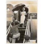 Eve Arnold OBE, American 1912-2012- Marilyn at Champaign Airport; silver gelatin print on wove,