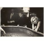 Eve Arnold OBE, American 1912-2012- Marilyn and the cast of the Misfits at the casino; silver
