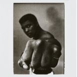 Thomas Hoepker, German b.1936- Muhammad Ali, boxing world heavyweight champion showing off his