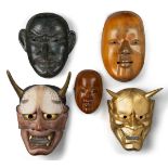 A collection of Japanese Noh masks, 20th Century, two metal mask, a tengu and a hanya painted in