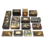 Eleven Japanese boxes and a pair of lacquer panels, Meiji period and later, to include two cloisonné