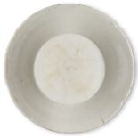 A Chinese porcelain white-glazed small dish, Song dynasty, on short foot with straight sides that