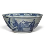 A large Chinese porcelain blue and white bowl, 19th century, decorated with scholars and