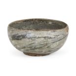 A rare Korean 'yeonrimun' marbled pottery bowl, Goryeo dynasty, 12th century, on short foot with