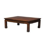 A Chinese rosewood low table, early 20th century, on square legs with carved feet, 105cm