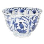 A Chinese porcelain Kraak blue and white 'birds' bowl, 17th century, painted to the exterior with