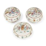 Three Chinese porcelain famille rose circular boxes, 19th century, painted to the covers with