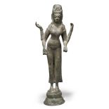 A Khmer bronze figure of Uma, Angkor period, the four-armed depiction of Uma cast standing on a