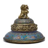 A Chinese gilt metal and cloisonne enamel cover, Jingtai mark, 18th century, with cast lion dog