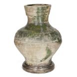 A Chinese pottery green-glazed jar, hu, Han dynasty, the exterior moulded with animal motifs and