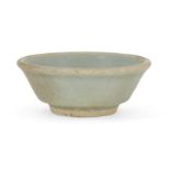 A Chinese grey stoneware celadon small bowl, Yuan-early Ming dynasty, of flared form with slightly