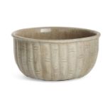 A Korean stoneware celadon 'bamboo' bowl, Goryeo dynasty, the exterior moulded as a band of bamboo