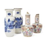 A pair of Chinese Canton export porcelain famille rose vases, late 19th century, painted with scenes