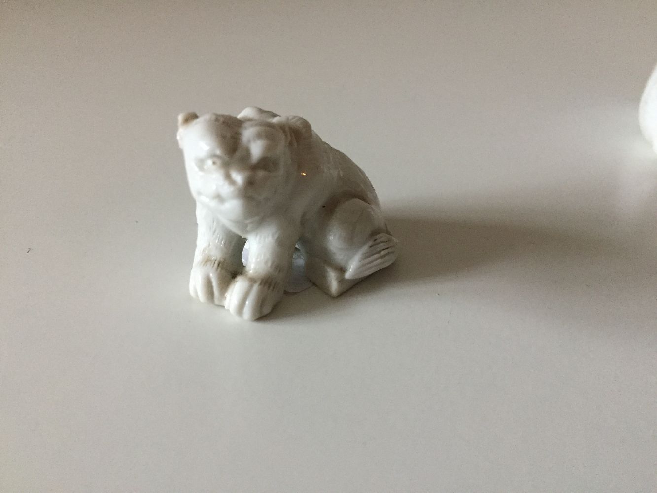 Two Chinese Dehua porcelain miniature animals, 18th century, one modelled as a seated lion, the - Bild 6 aus 6