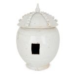 A Chinese porcelain white ware model of a granary, Song dynasty, the domed attached cover with