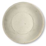 A Chinese porcelain white-glazed dish, Song dynasty, the glaze of ivory white tone, the rim