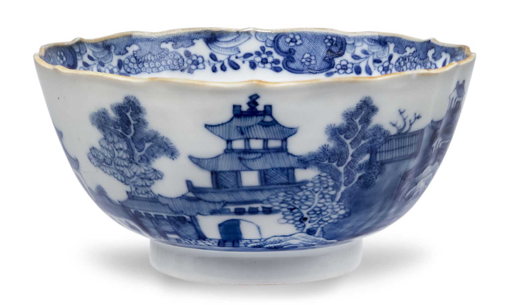 A Chinese porcelain blue and white bowl, 18th century, painted with pagodas in a continuous