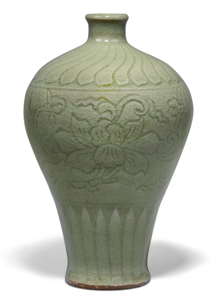 A Chinese grey stoneware Ming-style celadon 'lotus' vase, 19th century, the exterior carved with two