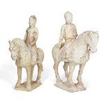 Two Chinese pottery horses and riders, Tang dynasty, one modelled as a female rider wearing a