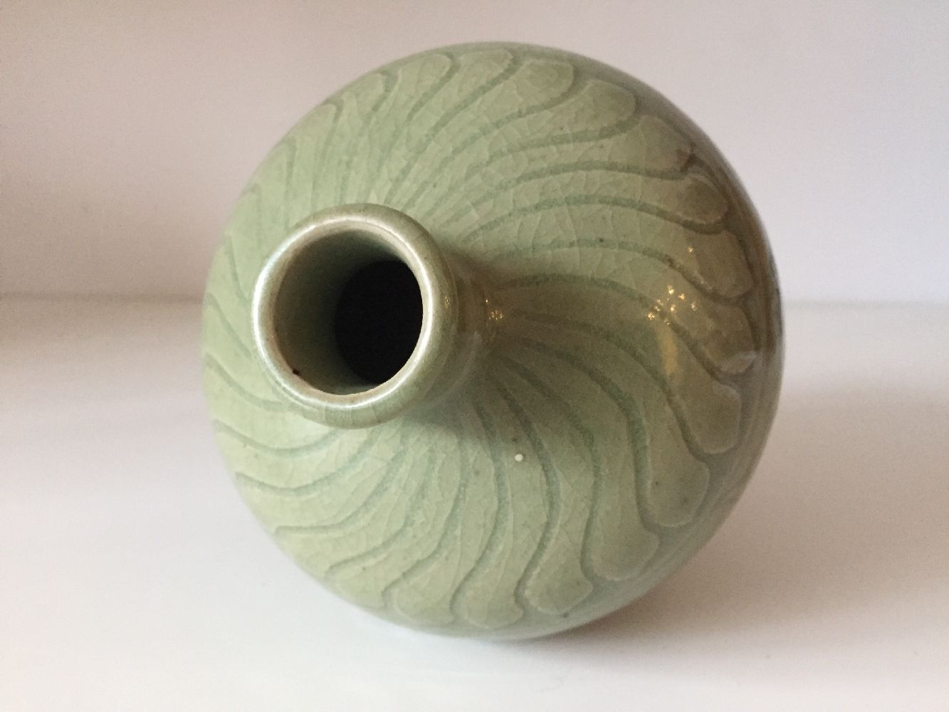 A Chinese grey stoneware Ming-style celadon 'lotus' vase, 19th century, the exterior carved with two - Bild 7 aus 7